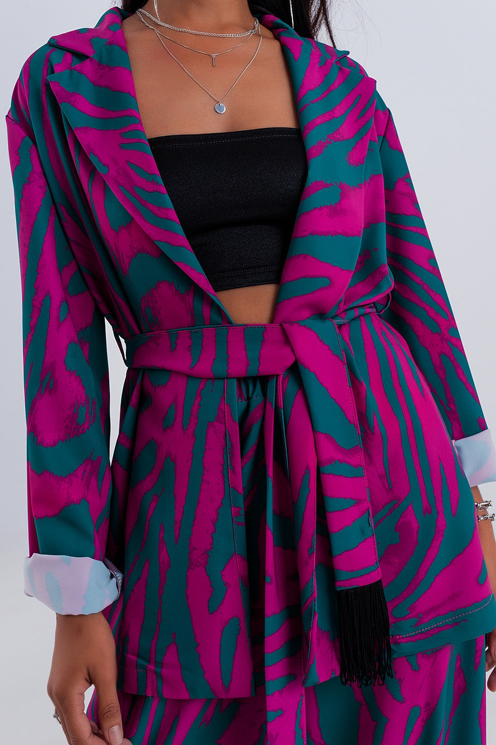 Blazer verde com cinto de impressão animal
