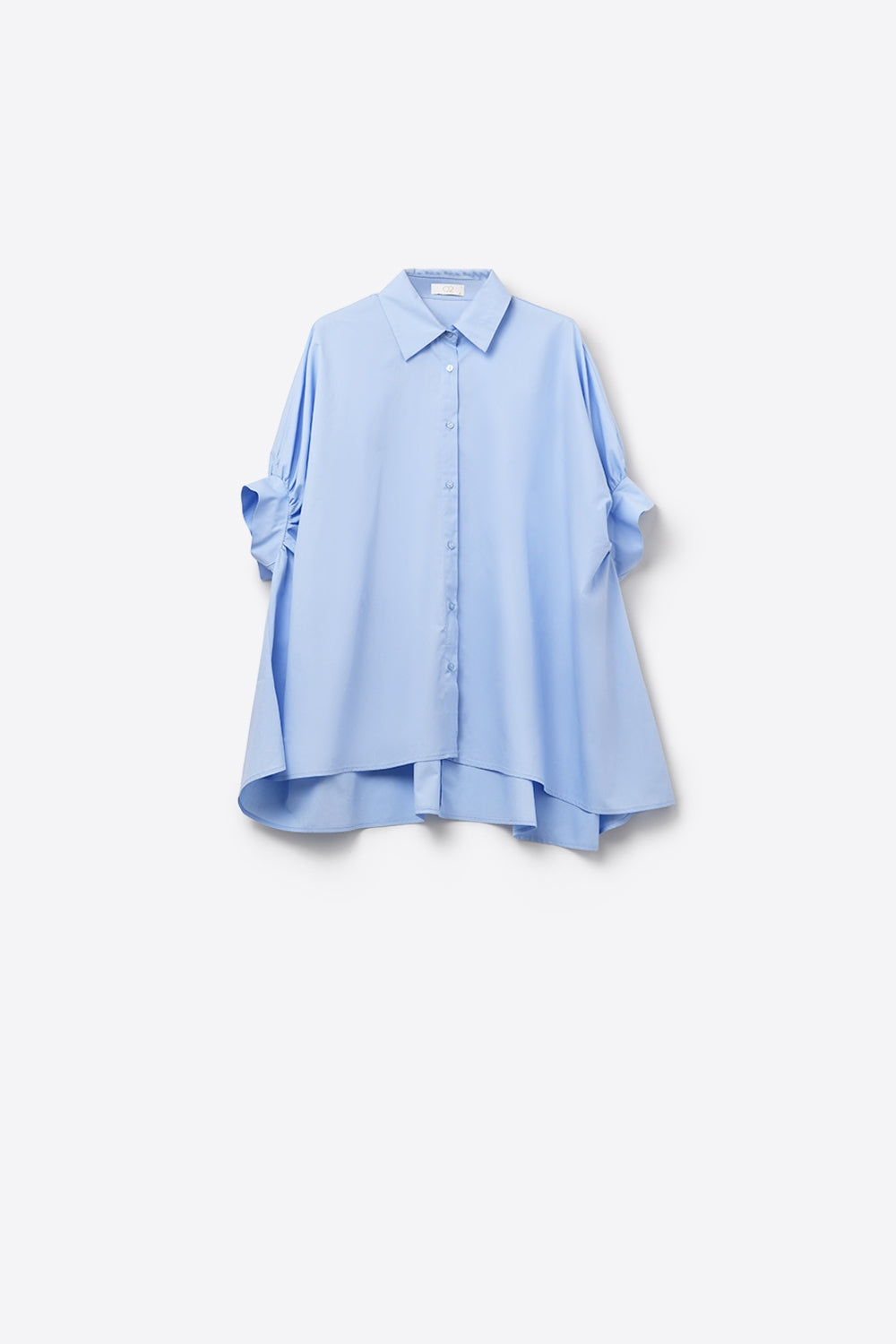 Blusa azul-bebé de grandes dimensões com manga curta