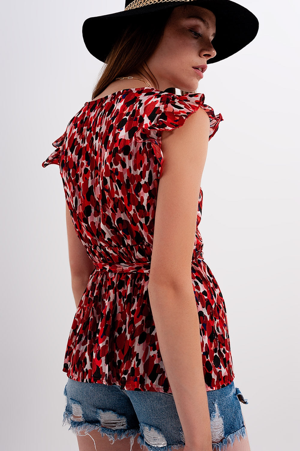 Blusa chiffon de impressão animal com detalhe de rufos