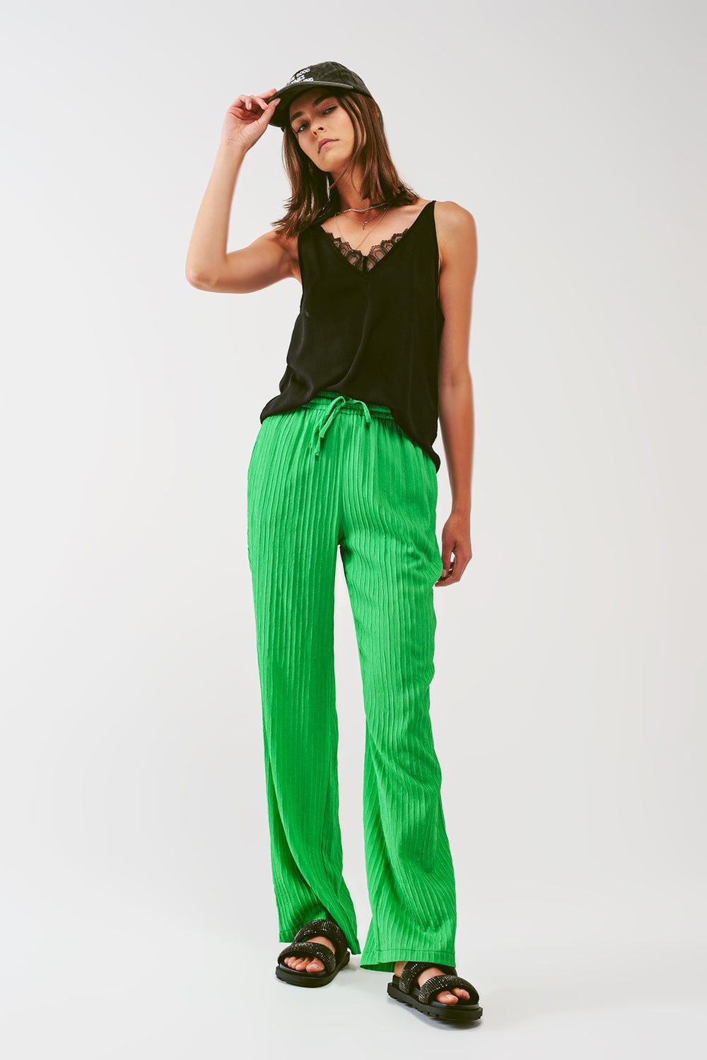 Calça listrada folgada em verde