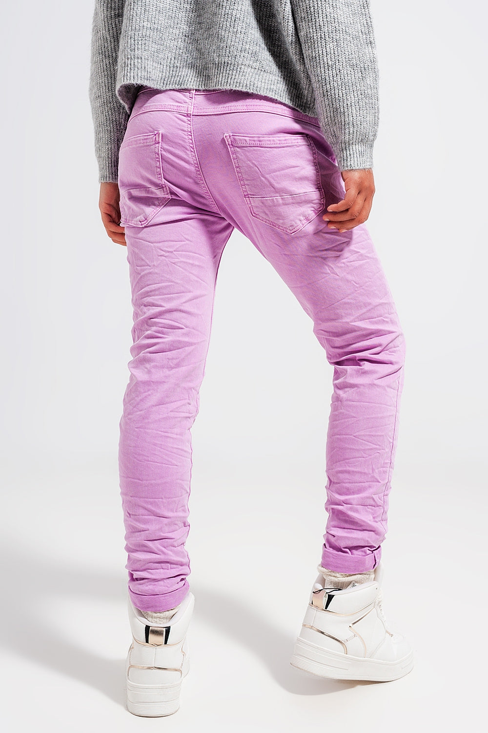 Calças de ganga skinny rosa com fecho de botão exposto
