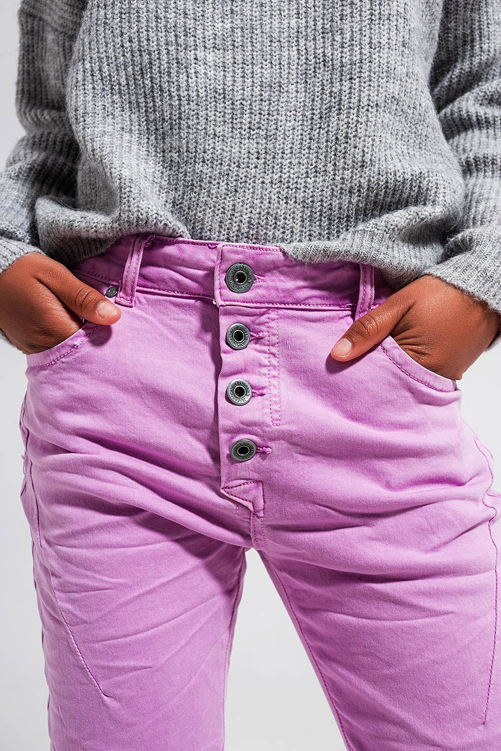 Calças de ganga skinny rosa com fecho de botão exposto