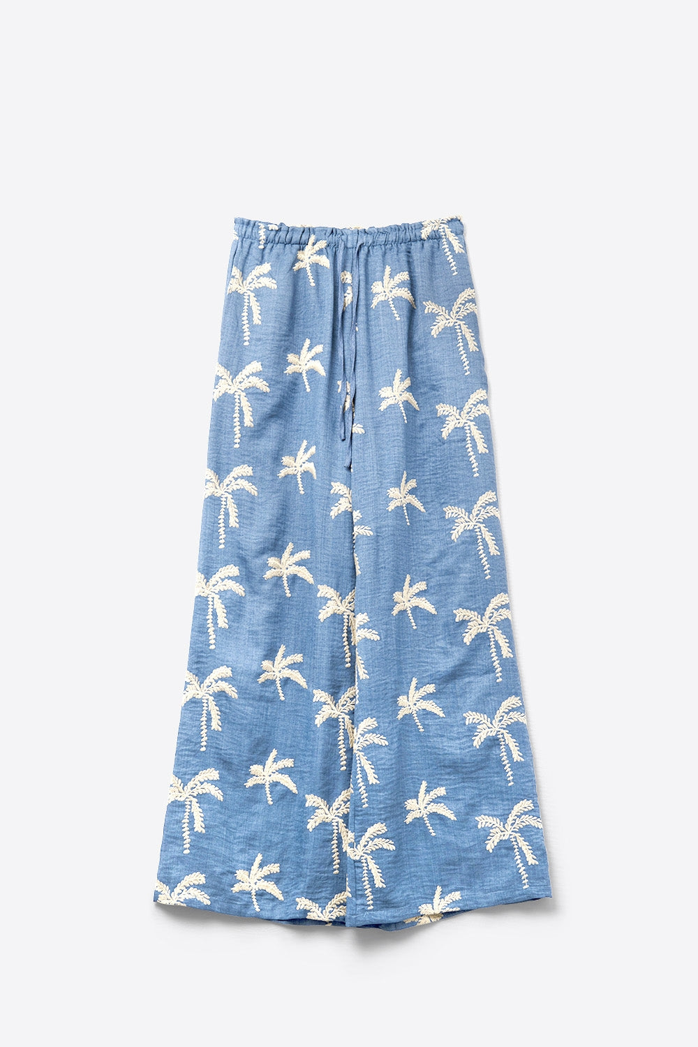 Calça de perna larga azul com bordado de palmeira bege