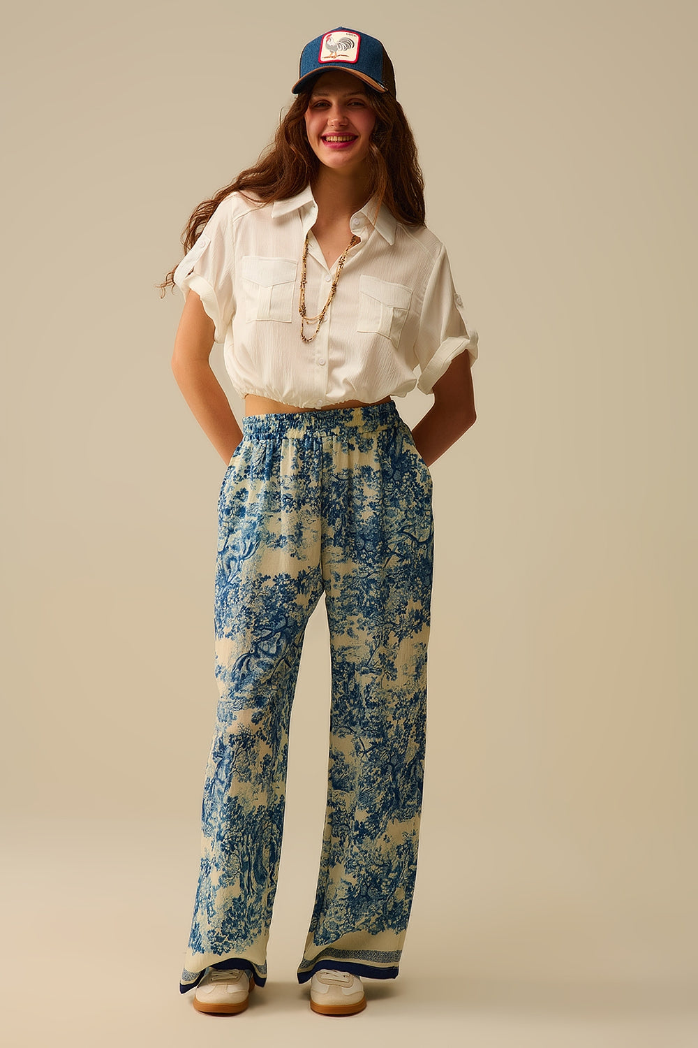 Calças fluidas com estampado Toile de Jouy e cintura elástica