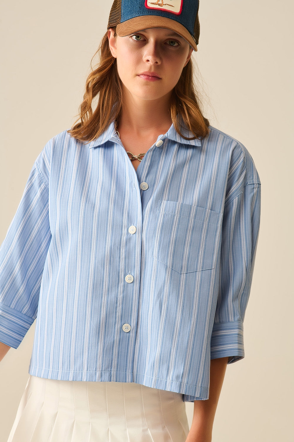 Camisa às riscas com corte oversized em azul