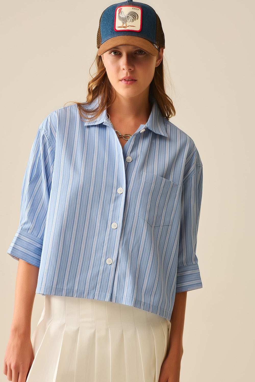 Camisa às riscas com corte oversized em azul