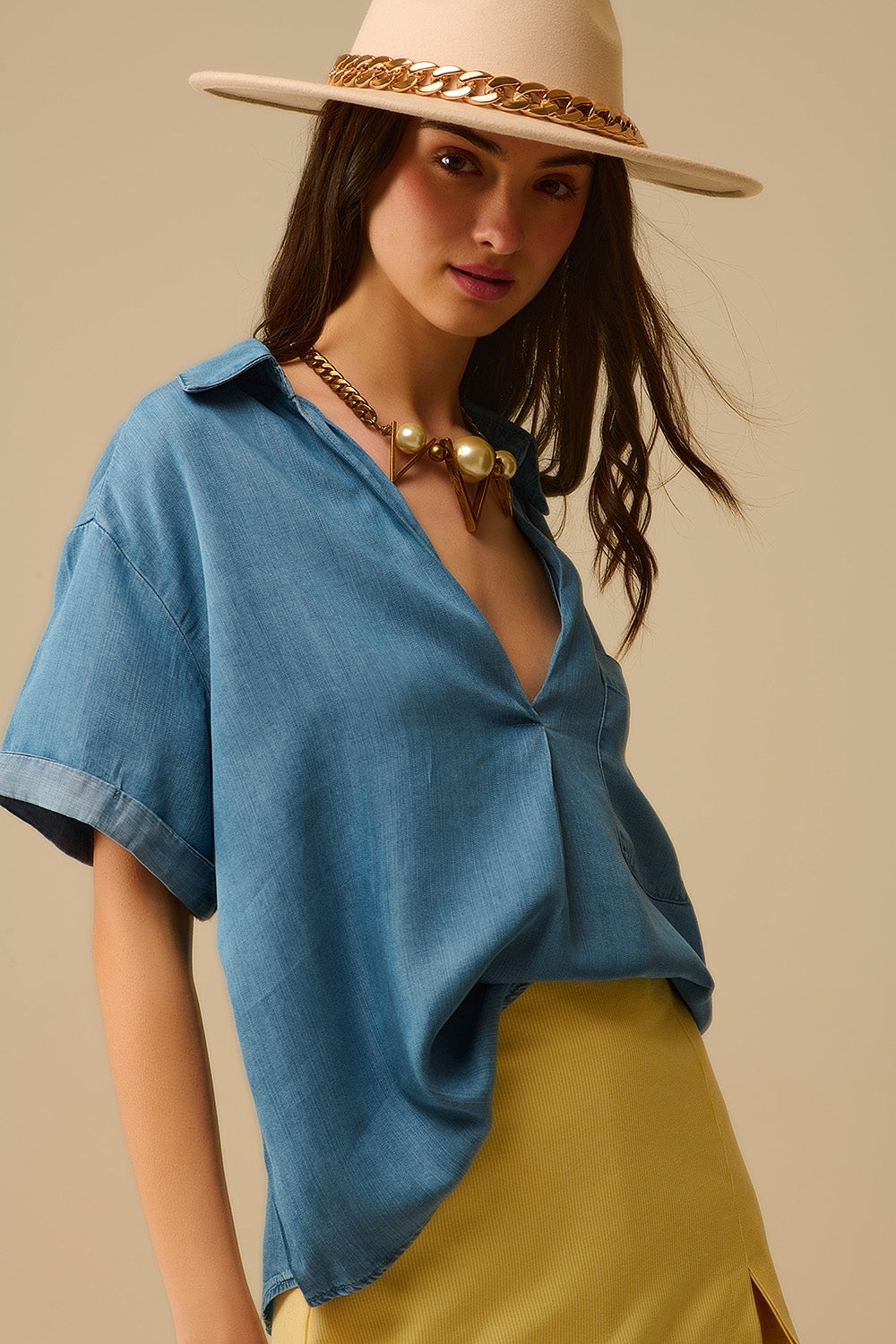 Camisa de manga curta em Tencel com bolso no peito em azul
