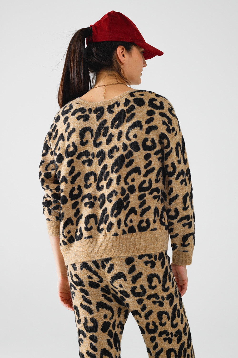 Casaco de manga comprida com estampado de leopardo e detalhes de laços