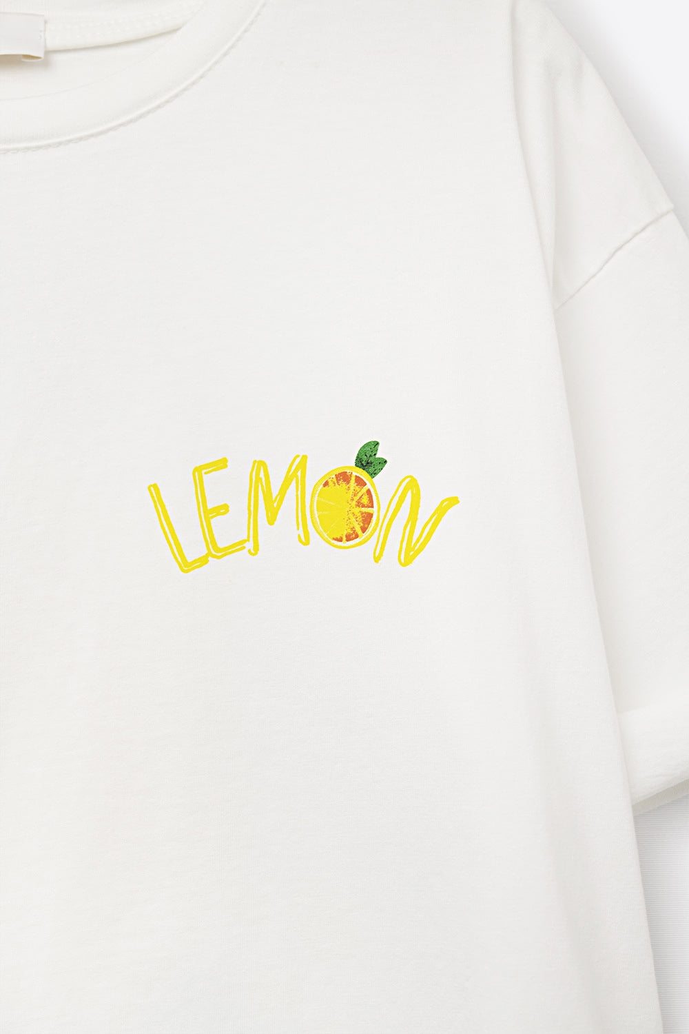 Feita na Itália camiseta branca com estampa de limão