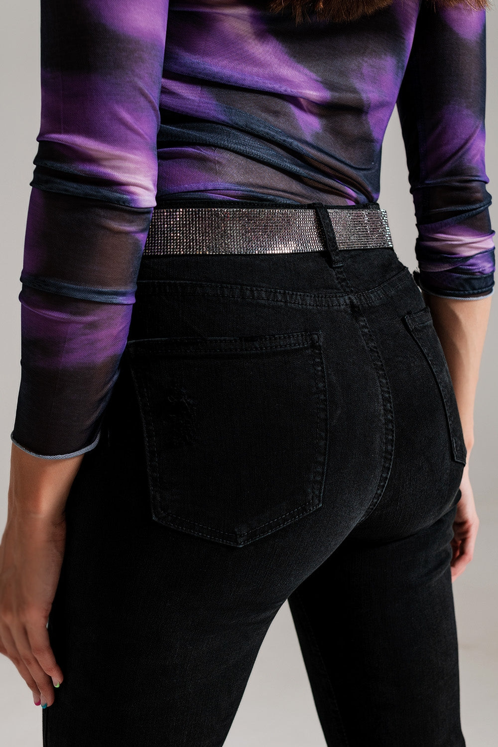 Jeans skinny de cintura alta com bainha desgastada em preto