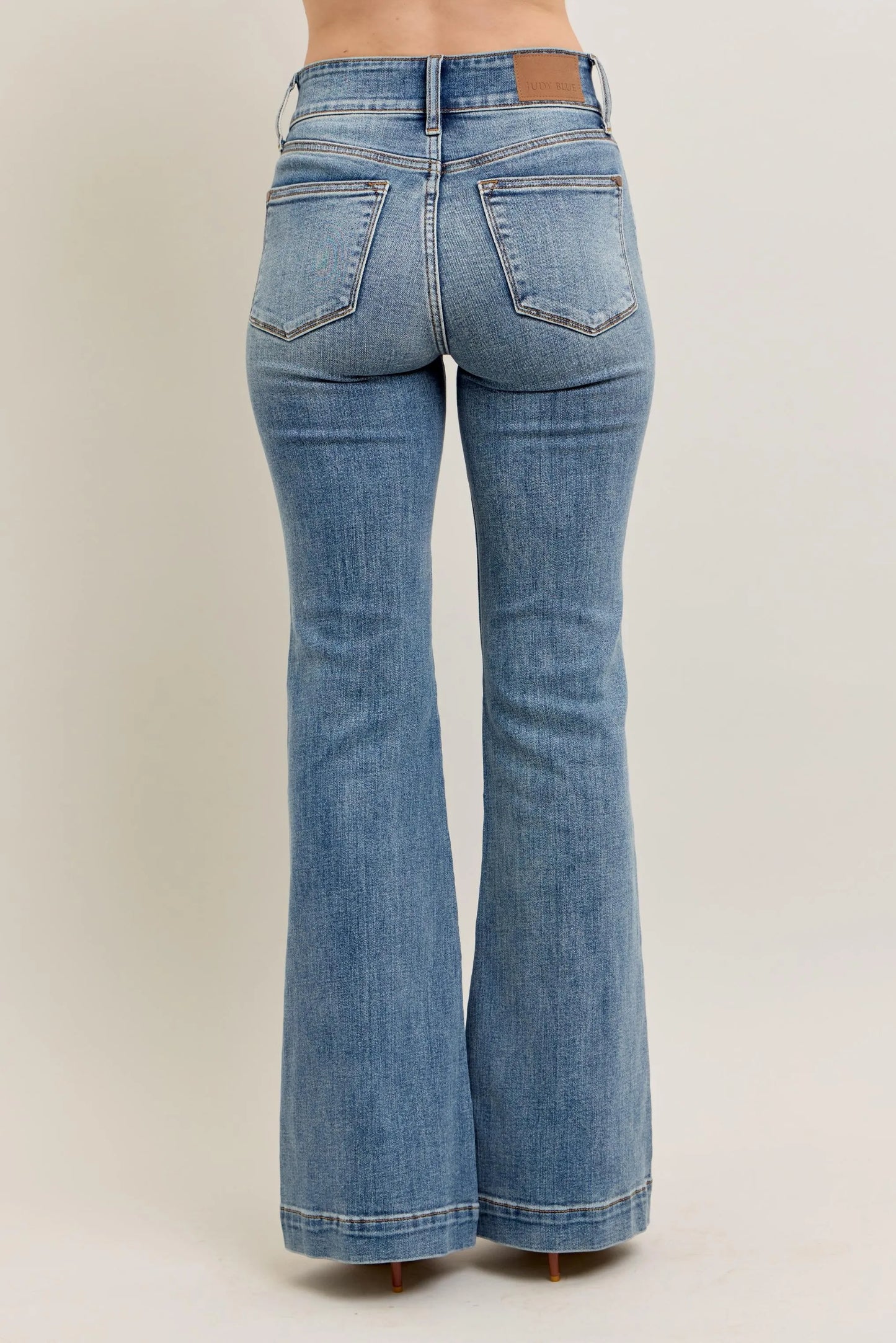 Judy Blue front seam denim pants in light blue wash with back pockets and flared legs