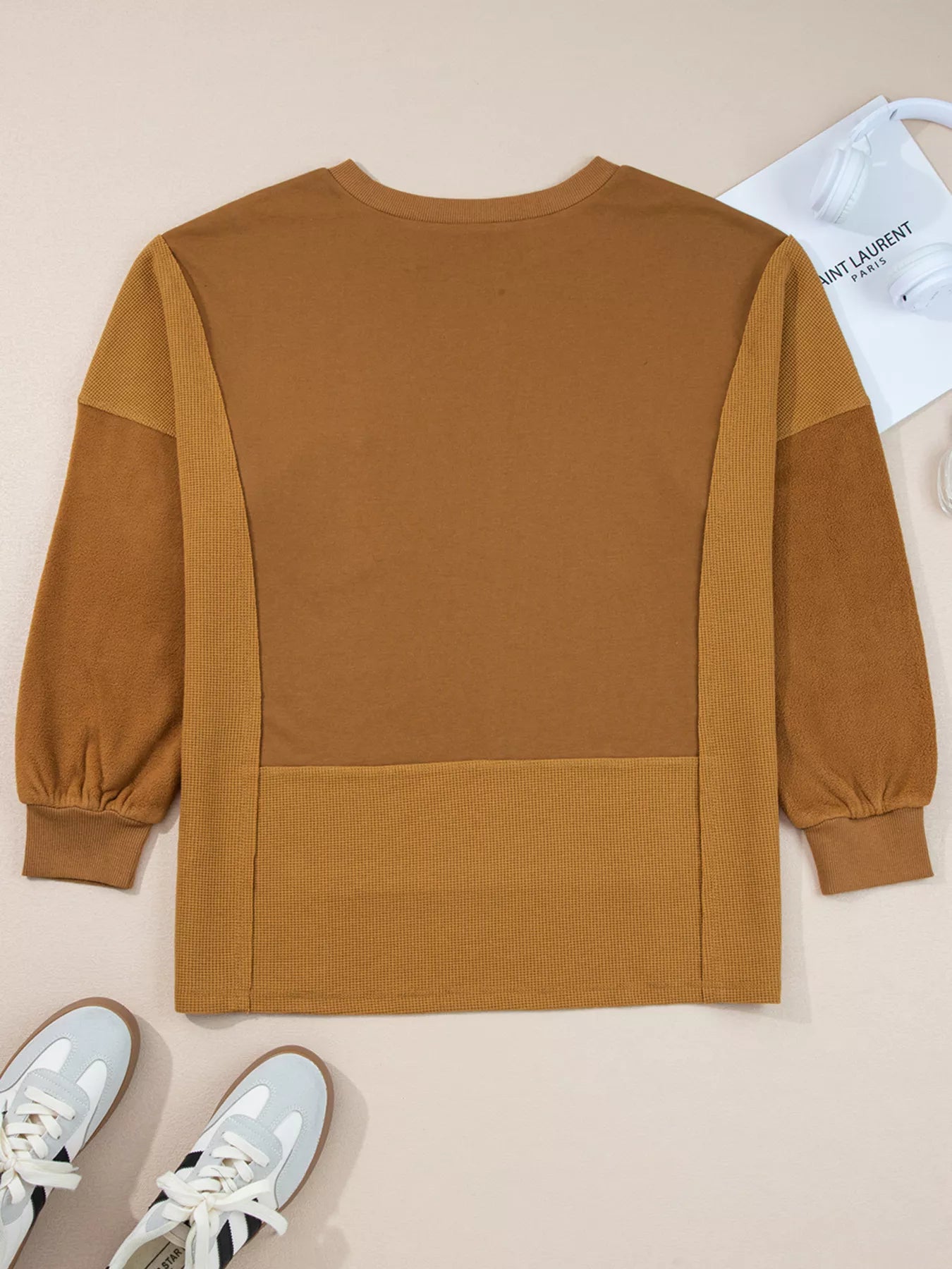 Back view of an Oversized Textured Split Neck High Low Sweatshirt in brown with balloon sleeves