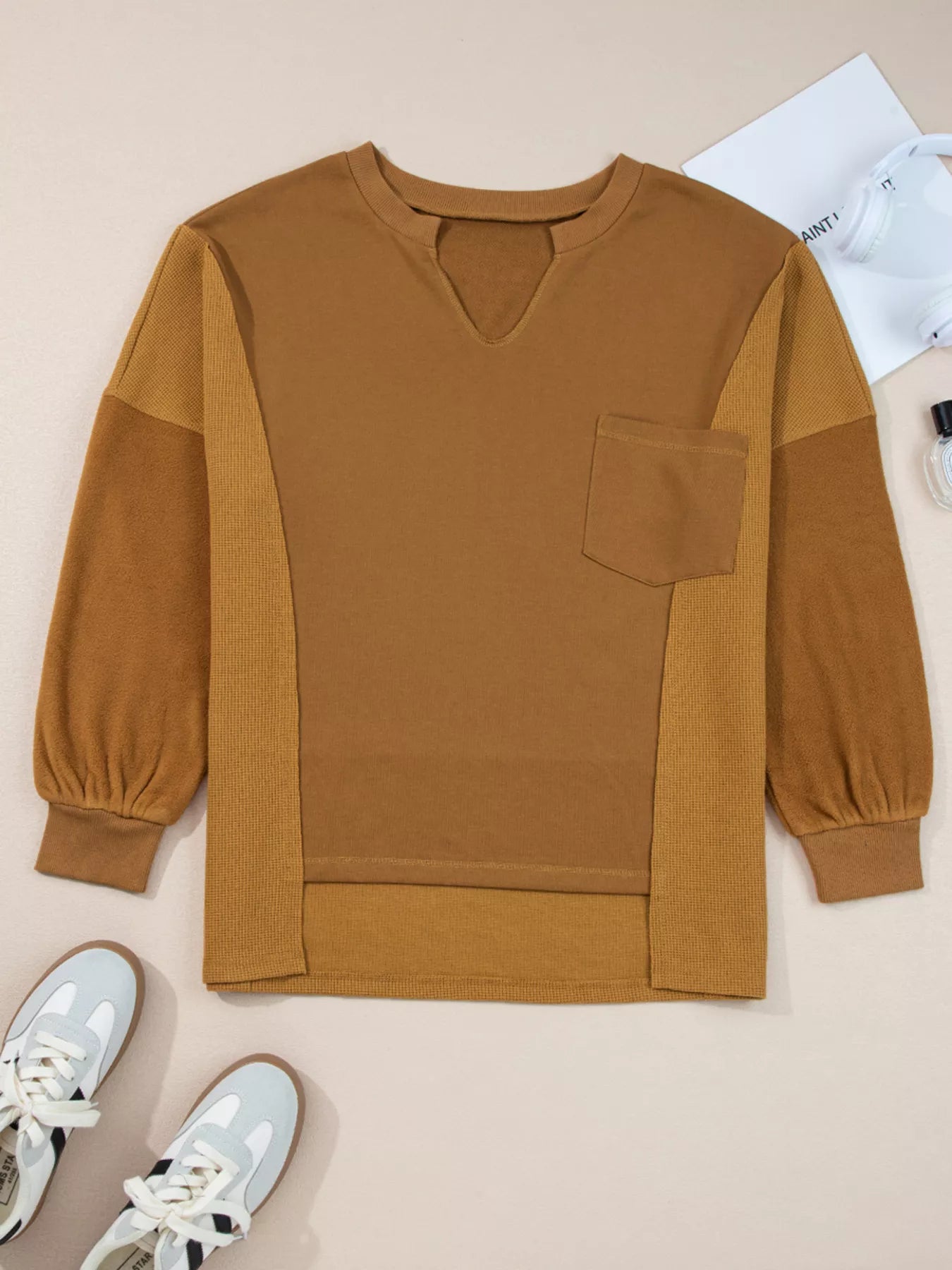 Oversized Textured Split Neck High Low Sweatshirt in warm brown with puff sleeves and a front pocket