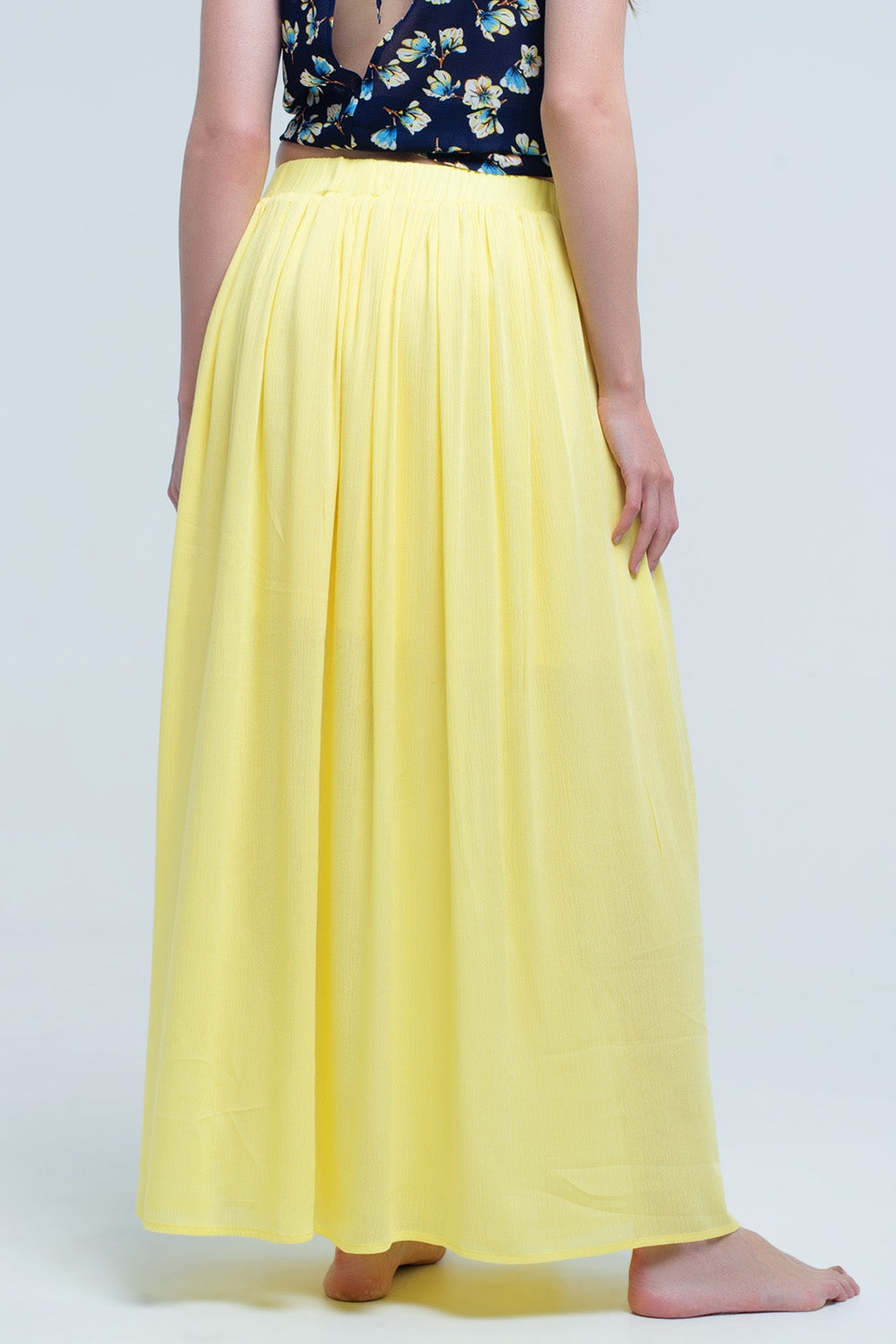 Saia maxi amarela com bolsos