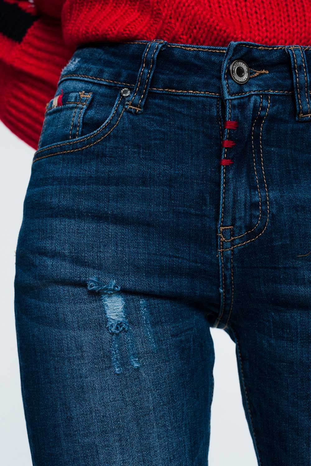 jeans skinny com detalhe de desgaste