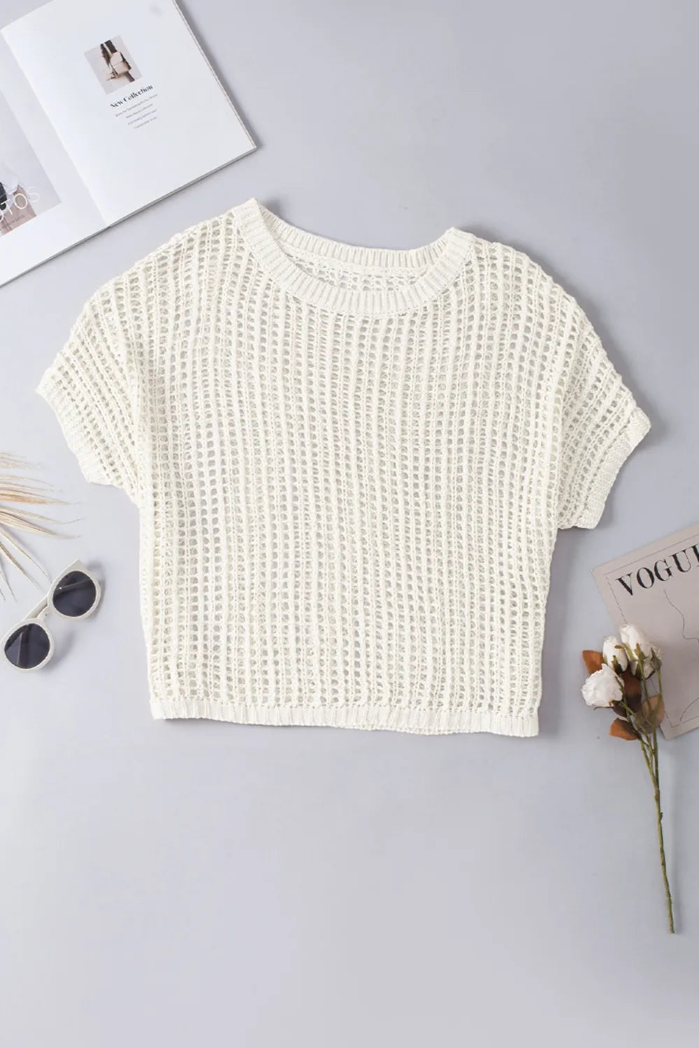 Cream knit beach cover up camisola with short sleeves and open weave design