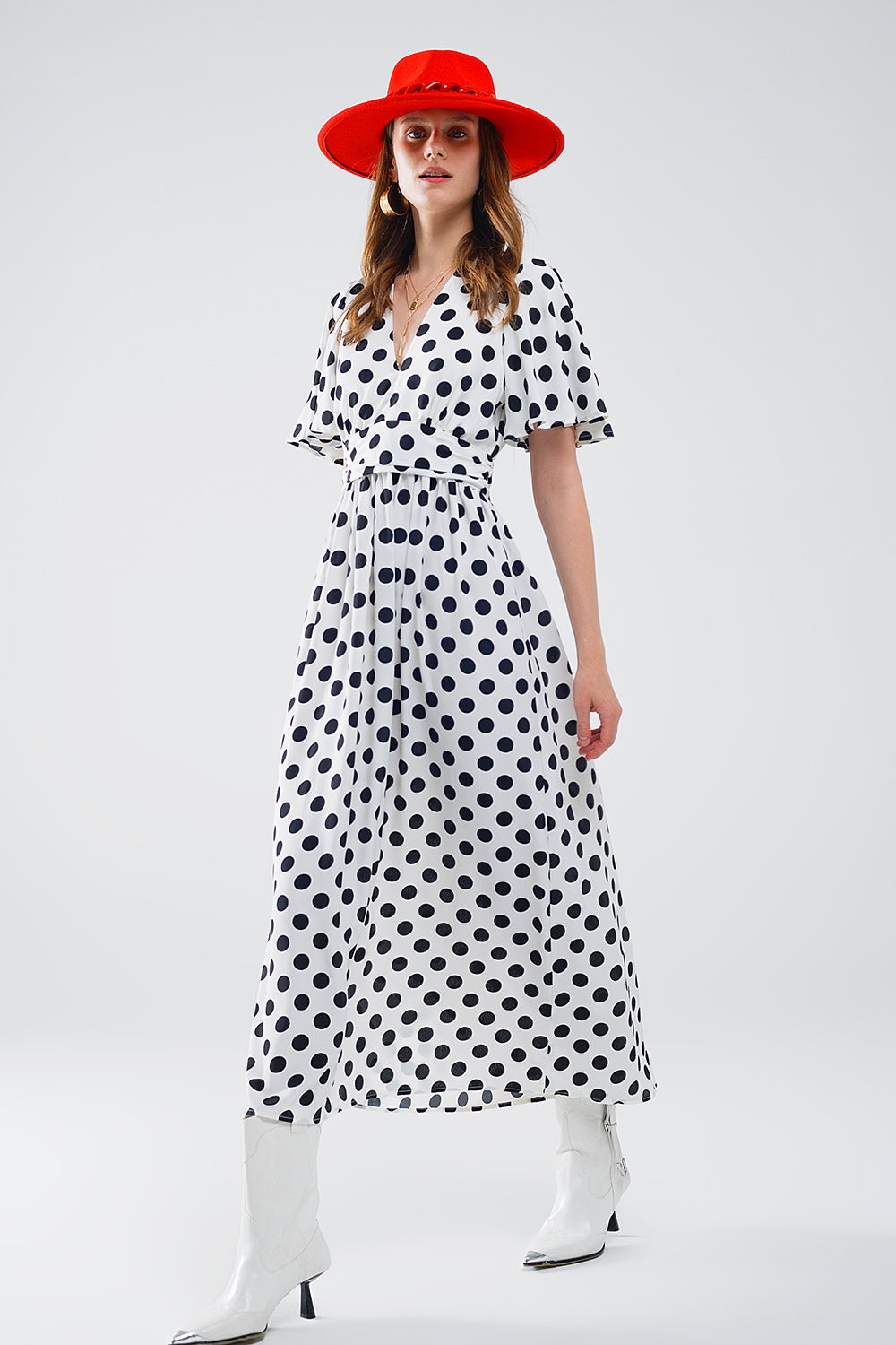Vestido maxi de bolinhas com pormenor aberto nas costas