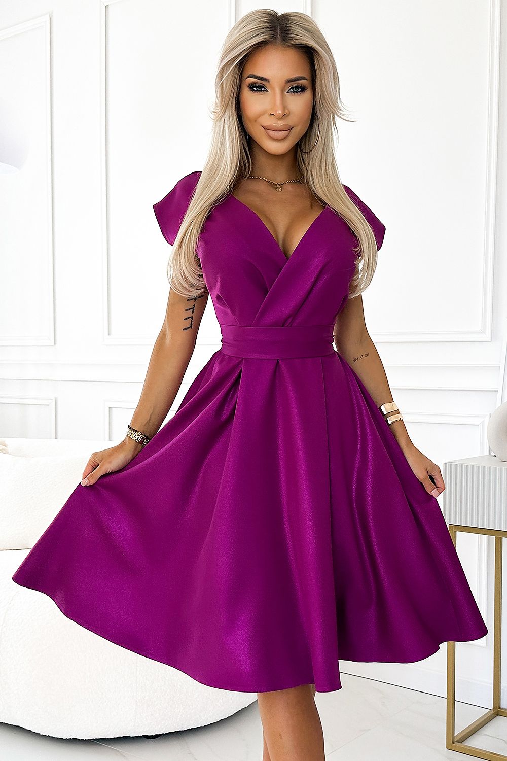 Vibrant formal dress for women in rich purple with a flattering V-neck and fitted waist