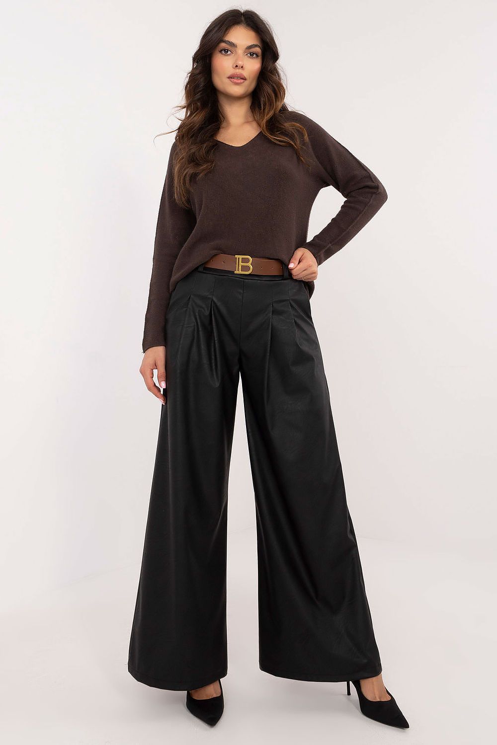 Italy Moda wide leg faux leather trousers in black worn with a brown sweater and belt