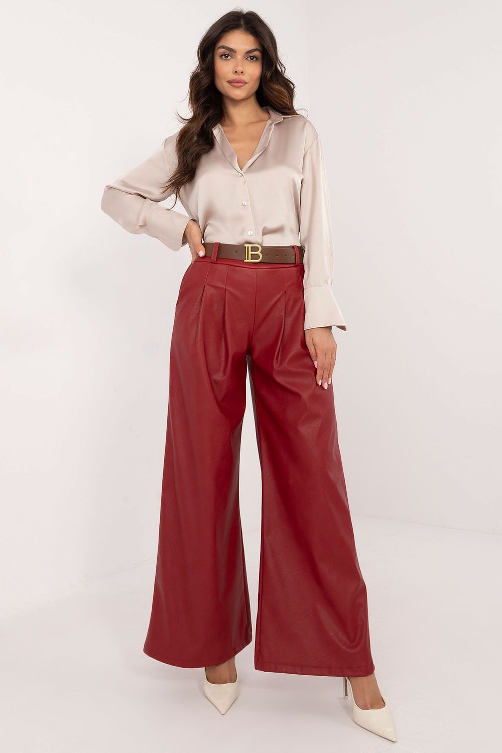 Italy Moda wide leg faux leather trousers in red worn with beige blouse and belt