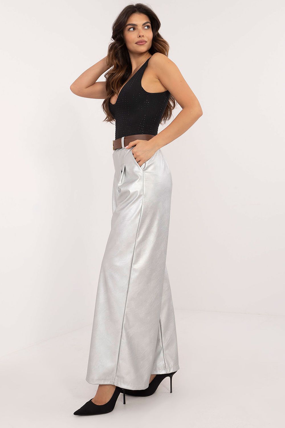 Italy Moda silver wide leg faux leather trousers worn with black sleeveless top and heels