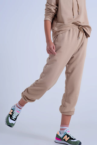 Calça jogger com cós ajustável em bege