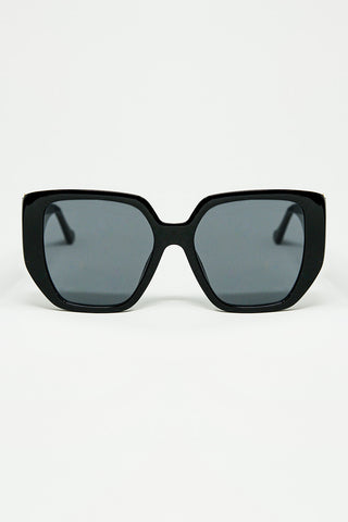Black pin-up style sunglasses with geometric design and cat eyes