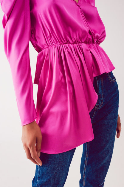 Blusa assimétrica com mangas bufantes em fúcsia