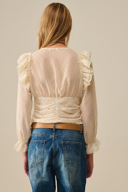 Blusa bege com pontos dourados e detalhes de folhos