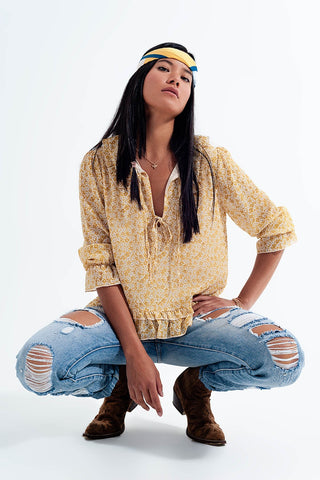 Blusa Chiffon com laço frontal e estampa floral amarelo