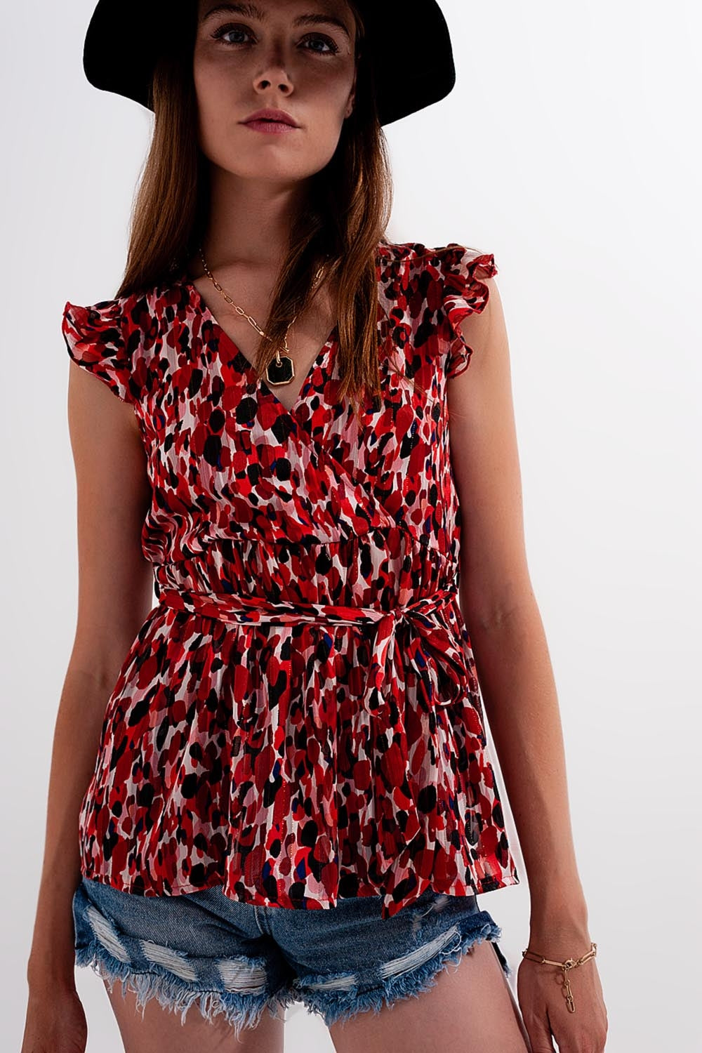 Blusa chiffon de impressão animal com detalhe de rufos