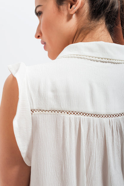 Blusa com mangas de rufos em branco