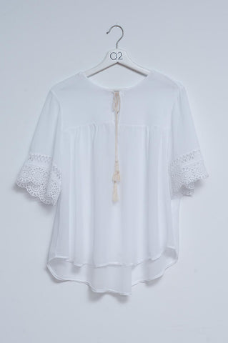 Broderie tie front blouse in white