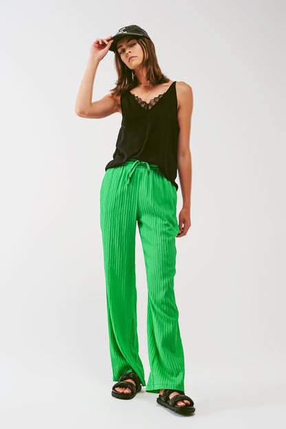 Calça listrada folgada em verde