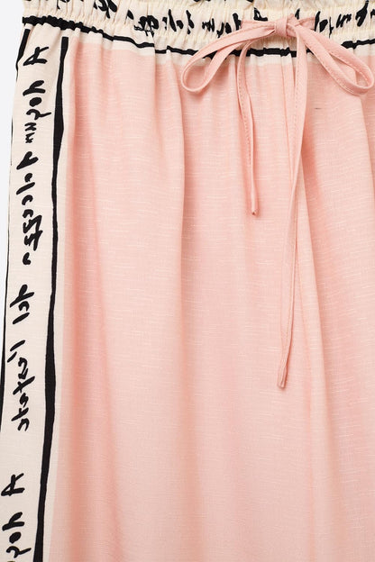 Calça cor-de-rosa com estampado de aguarela de verão