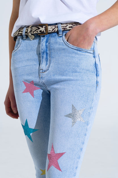 Calças de ganga skinny de lavagem clara com estrelas nas pernas