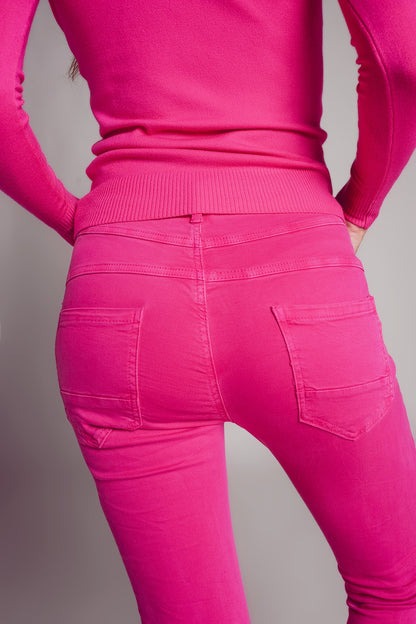 Calças de ganga skinny fuchsia com fecho de botão exposto