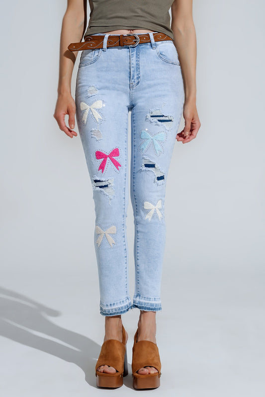 Q2 Calças de ganga super skinny azuis claras com laços e buracos rasgados