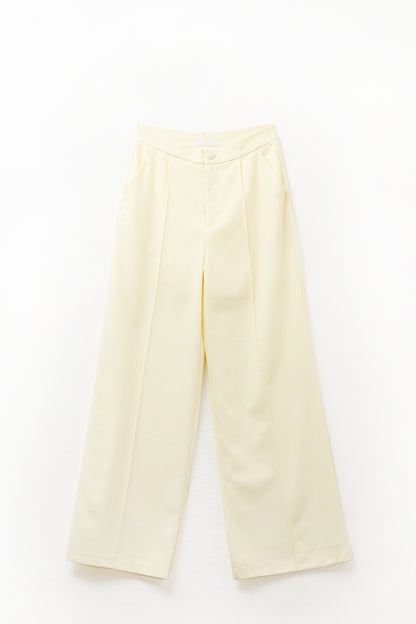 Calça de perna larga sob medida em amarelo