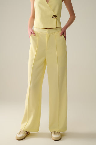 Calça de perna larga sob medida em amarelo