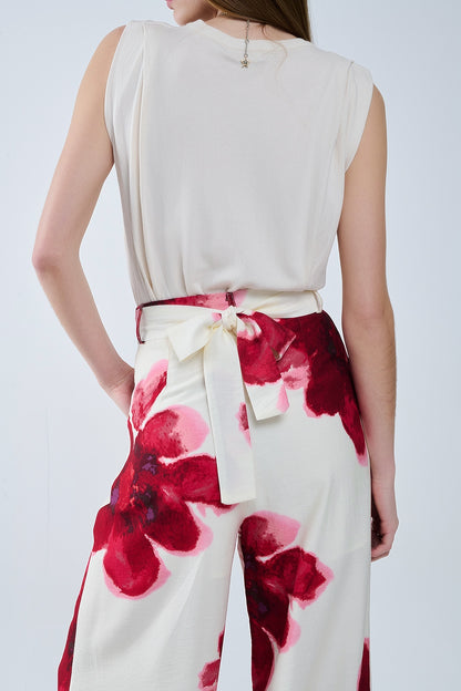 Calça Palazzo bege com estampado de flores Tropial vermelho e cinto a condizer