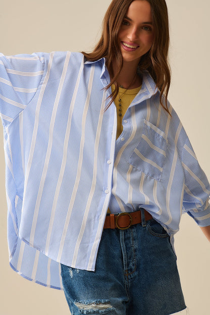 Camisa às riscas azul e branca de corte relaxado com laço nas costas