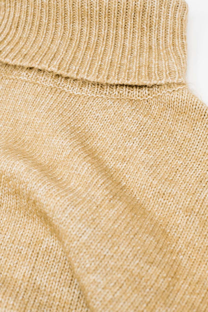 Camisola de gola alta bege com mangas descaídas