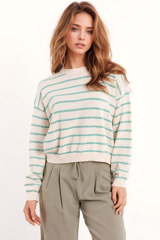 Camisola de ombros caídos em branco com riscos verdes