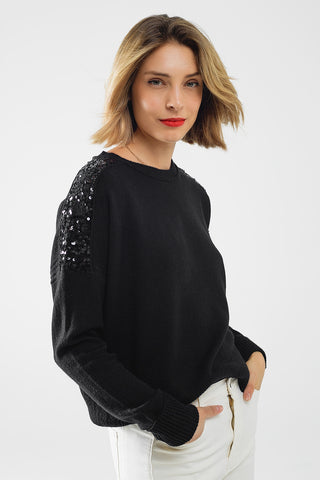 Camisola preta de mangas compridas com lantejoulas nos ombros