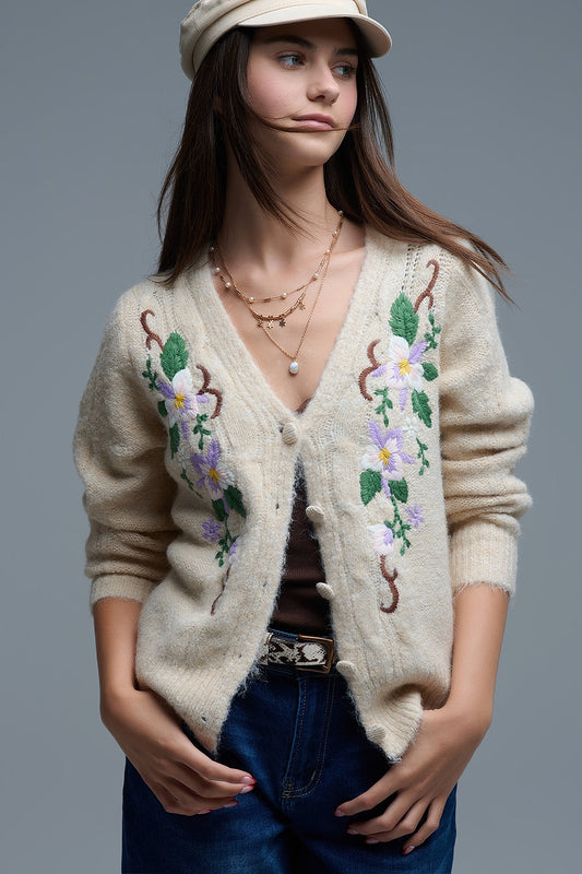 Q2 Casaco de malha bege com flores bordadas
