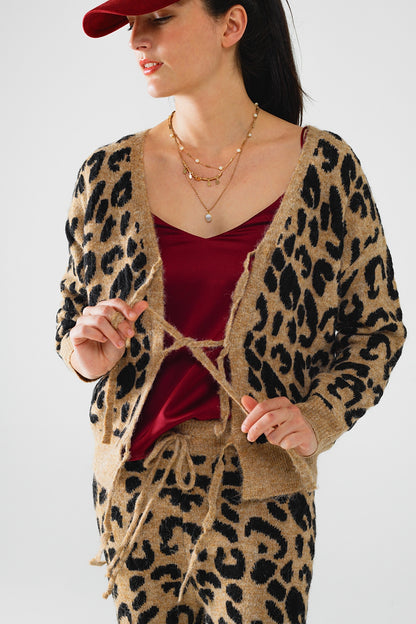 Casaco de manga comprida com estampado de leopardo e detalhes de laços