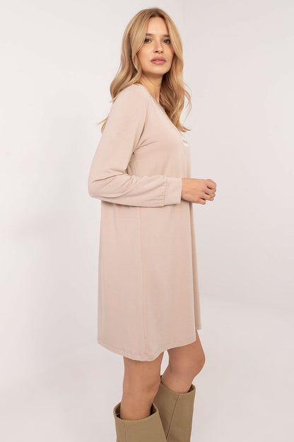 Relevance casual oversized mini dress in beige with long sleeves and relaxed fit