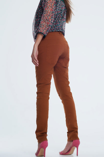 Jeans skinny com corte baixo na cor laranja