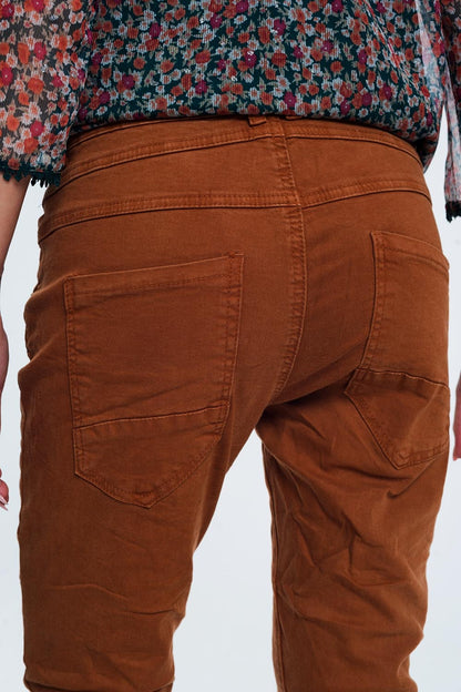 Jeans skinny com corte baixo na cor laranja